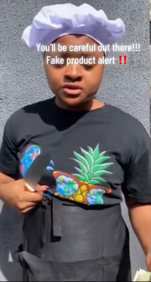Nigerian lady raises alarm over a fake product after noticing the wrong inscription on the seasoning label she recently bought
