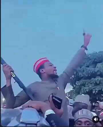 NDC Chieftain Brandishing A Gun At Kano Rally