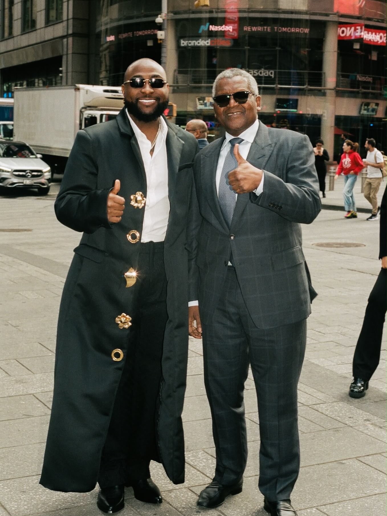 Davido Joins Aliko Dangote in NYC Times Square to Unveil Dangote Refinery Billboard | See Photos