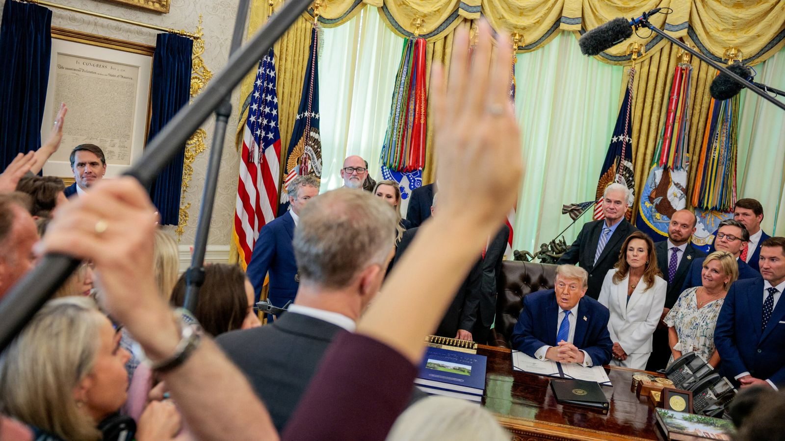 US Justice Department insists Trump can deny journalists White House access as it claims banned news outlets 'threatened national security'