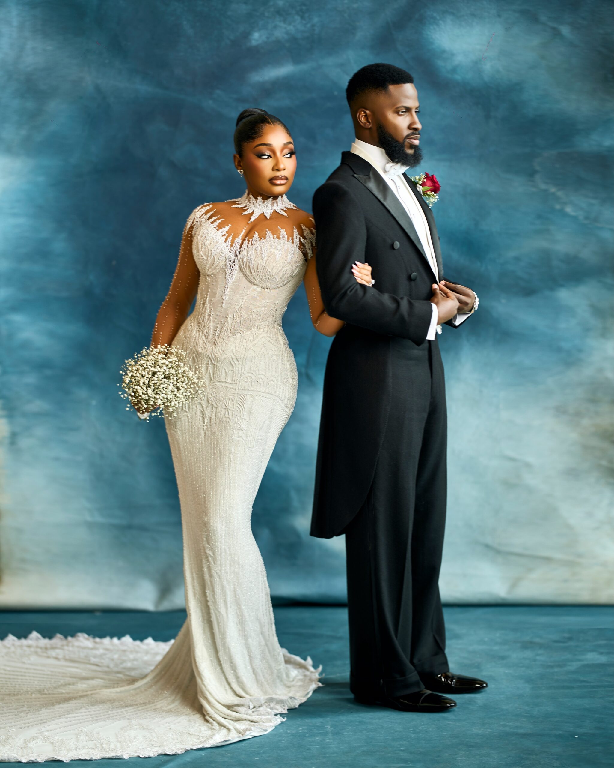 Akin Faminu & Kiky Festus Were Elegance Personified in Their White Wedding Looks