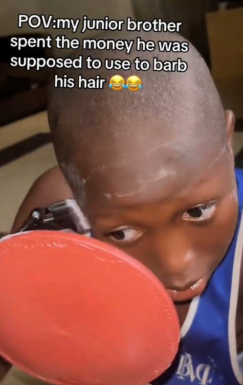 Young boy cuts his hair himself after spending the money meant to cut his hair at a barber’s shop (Video)