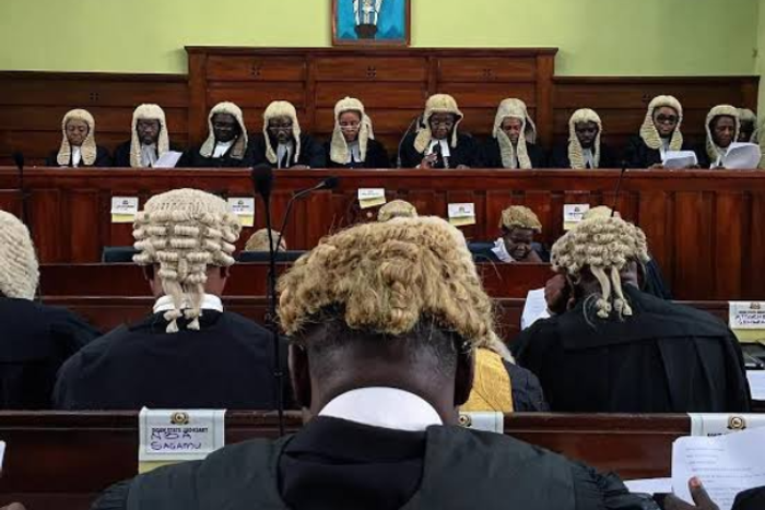 Man accused of killing three people collapses and dies after judge adjourns judgment in his trial